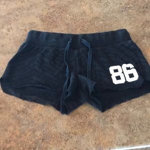 Black pair of “pink” shorts